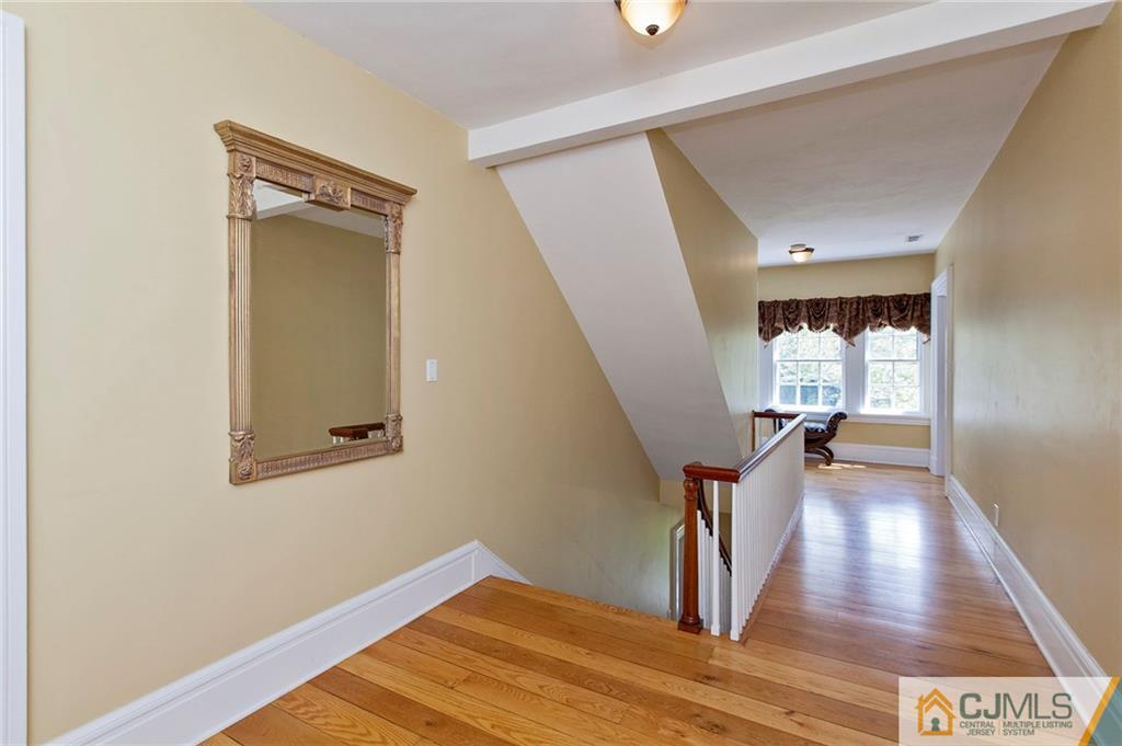 136 Mapleton Road Princeton, NJ 08540 - Photo 15 of 25 a view of entryway and hall with wooden floor
