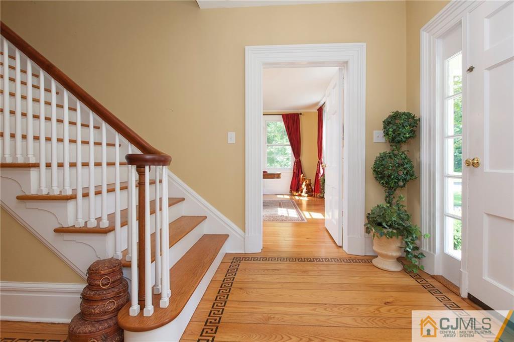 136 Mapleton Road Princeton, NJ 08540 - Photo 3 of 25 a view of entryway and hall with wooden floor