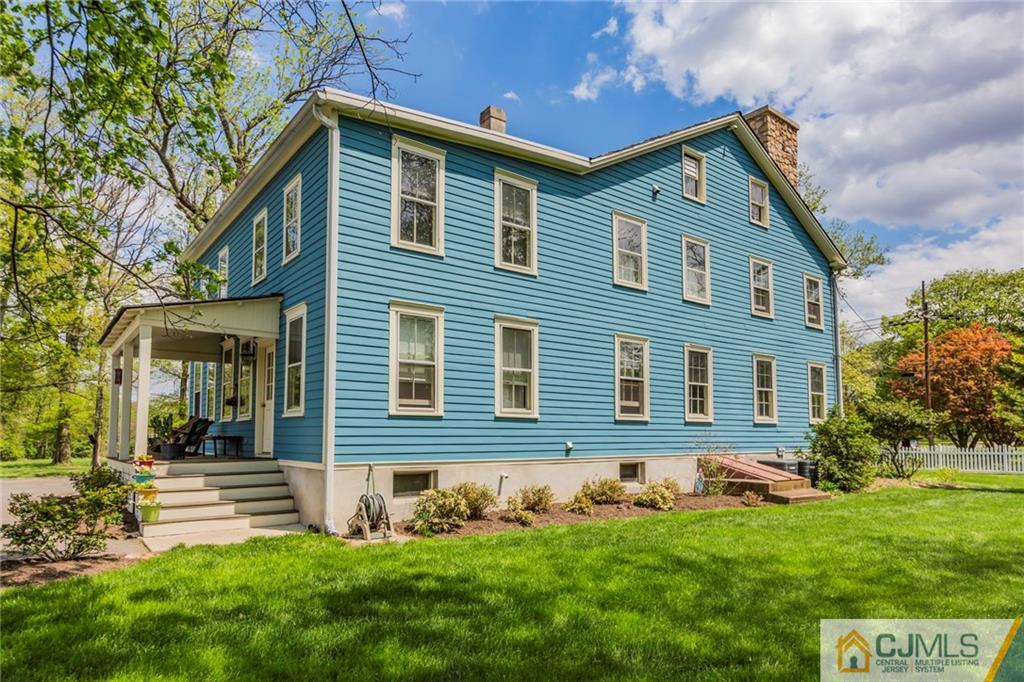 136 Mapleton Road Princeton, NJ 08540 - Photo 22 of 25 a front view of a house with a yard
