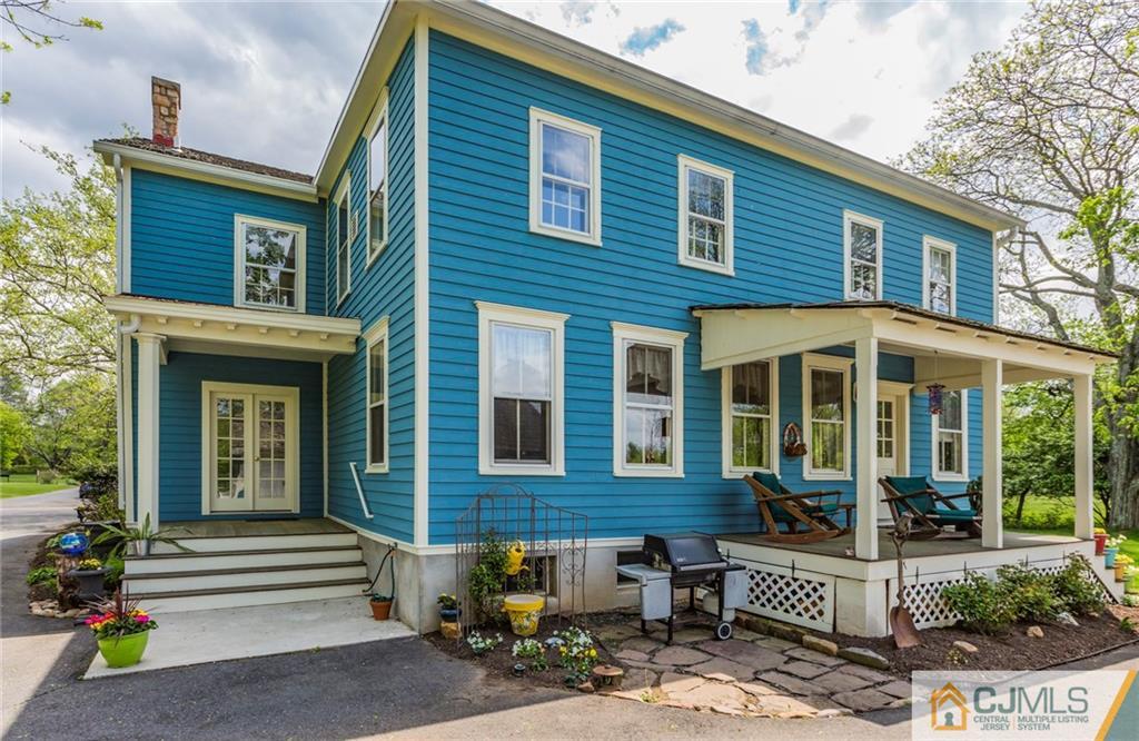 136 Mapleton Road Princeton, NJ 08540 - Photo 23 of 25 a front view of a house with a porch