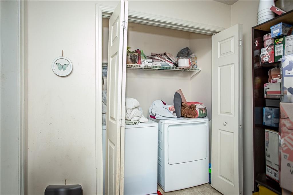 194 Cemetery Road Luthersville, GA 30251 - Photo 17 of 19 a utility room with dryer and washer