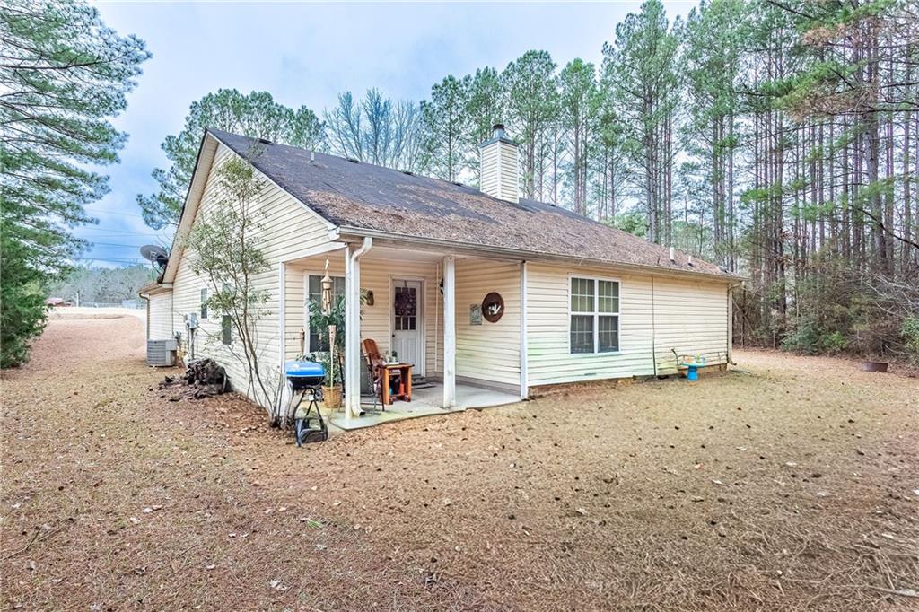 194 Cemetery Road Luthersville, GA 30251 - Photo 19 of 19 a view of a house with backyard