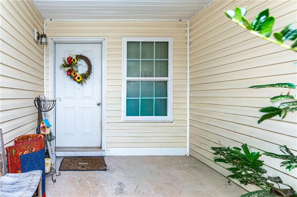 194 Cemetery Road Luthersville, GA 30251 - Photo 3 of 19 a view of a door and a window