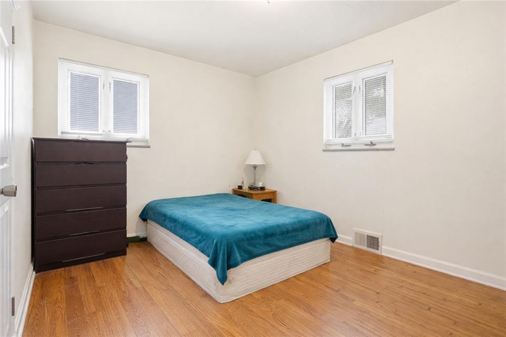 2129 Admiral Street Aliquippa, PA 15001 - Photo 19 of 34 a bedroom with a bed and a window