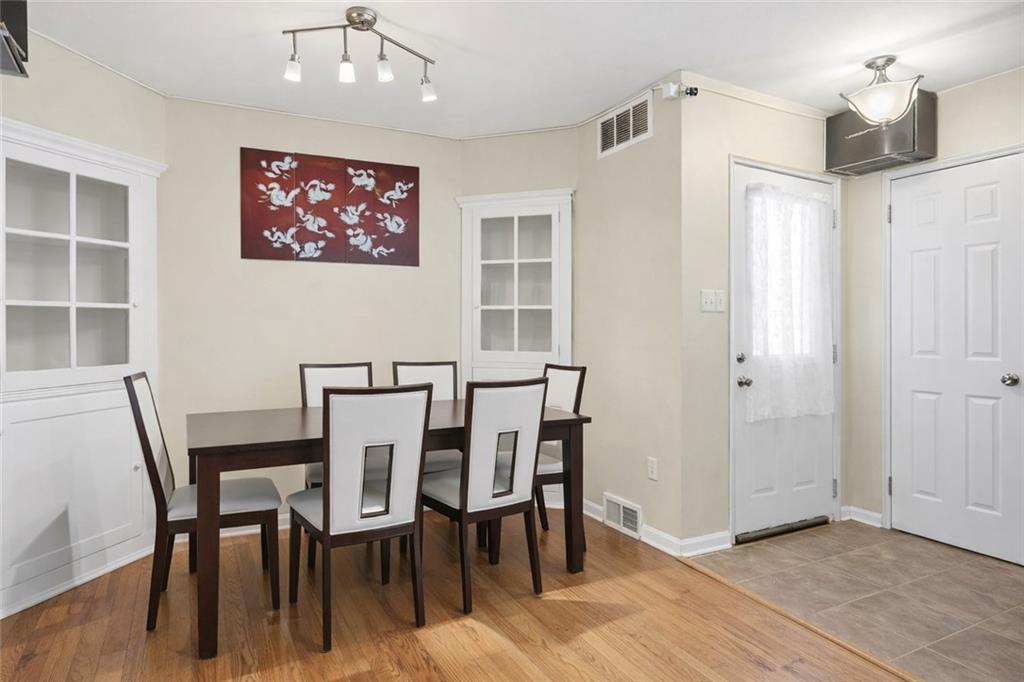 2129 Admiral Street Aliquippa, PA 15001 - Photo 7 of 34 a view of a dining room with furniture and wooden floor