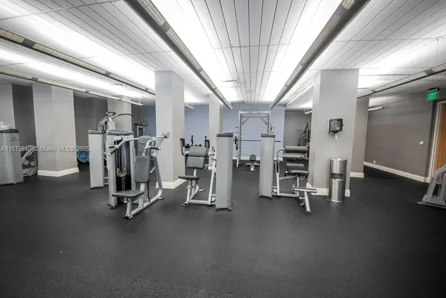 a view of a swimming pool and lounge chairs