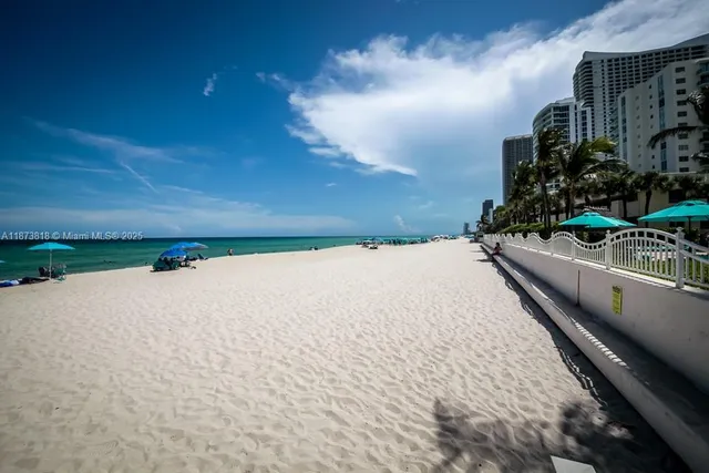 a view of balcony with yard
