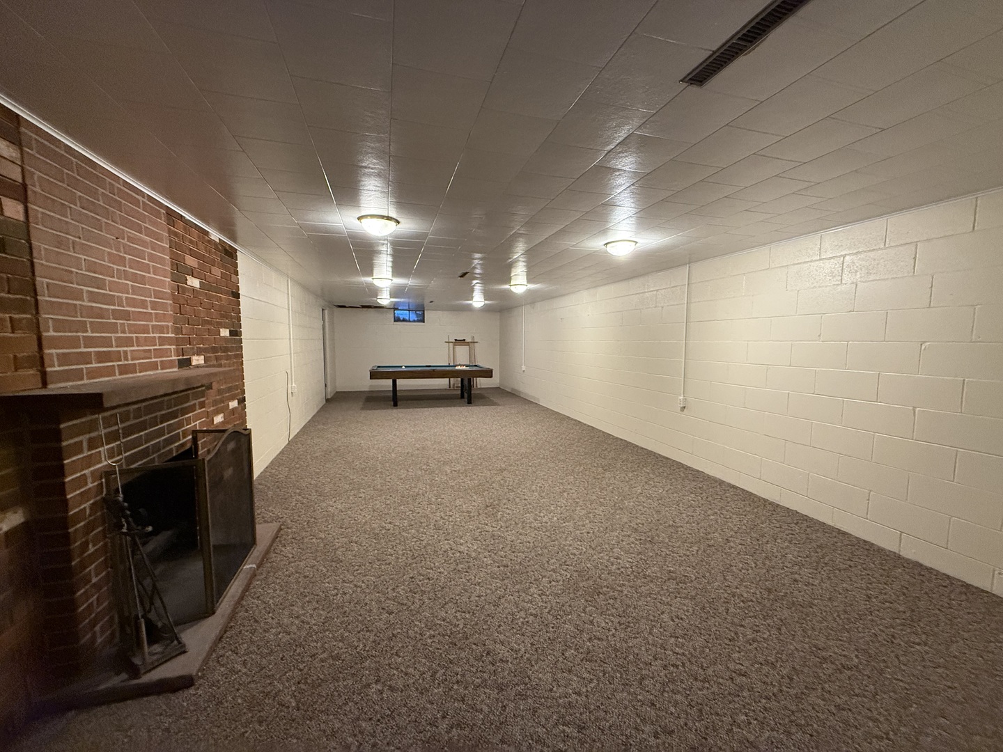 1048 Warren Street Henry, IL 61537 - Photo 23 of 26 a view of a hallway with a kitchen