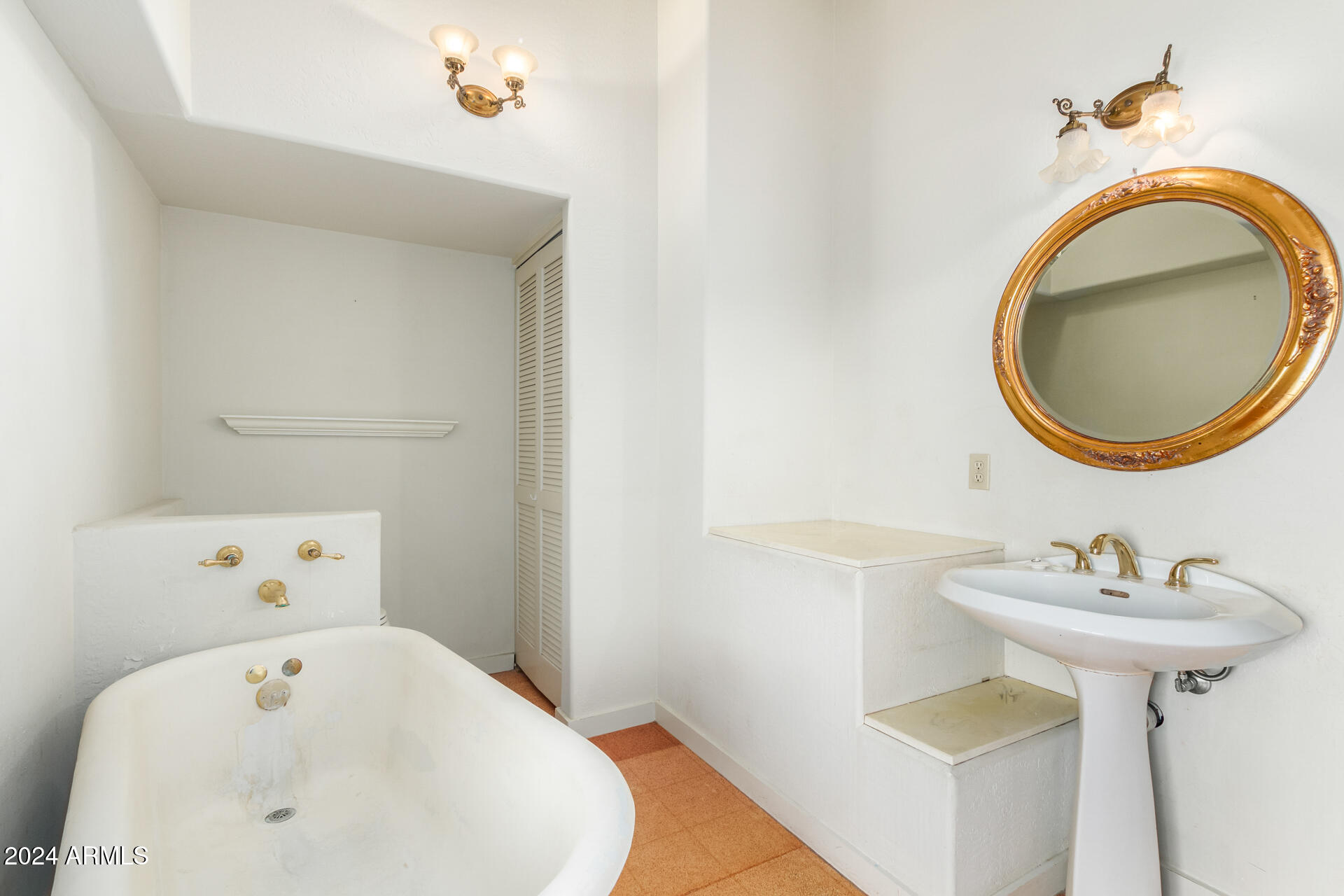 905 East Ocotillo Road Phoenix, AZ 85014 - Photo 14 of 20 a bathroom with a sink and a mirror