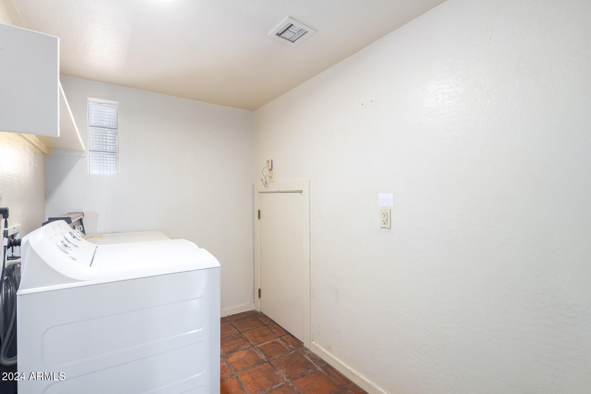 905 East Ocotillo Road Phoenix, AZ 85014 - Photo 17 of 20 a utility room with a sink dryer and washer