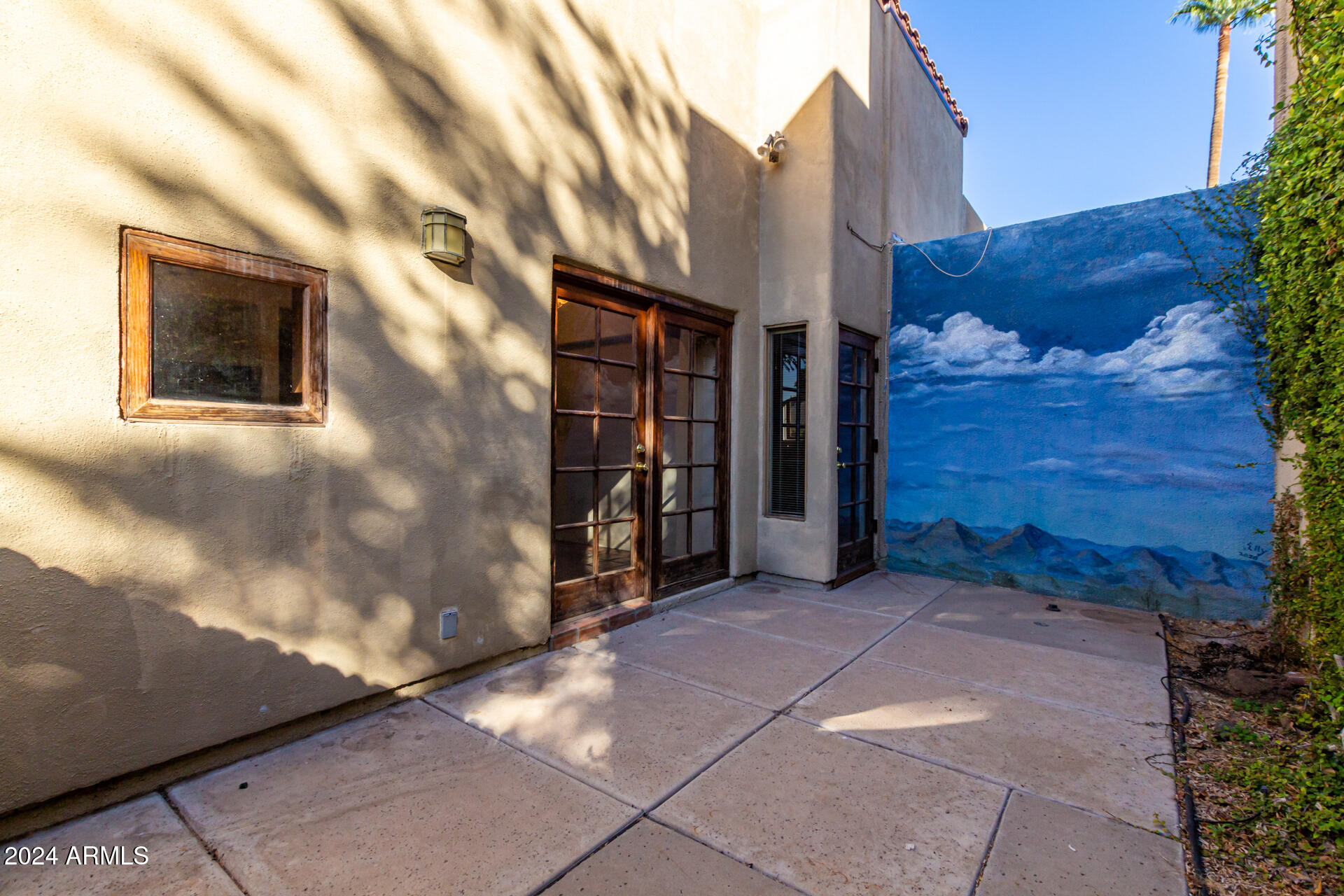 905 East Ocotillo Road Phoenix, AZ 85014 - Photo 19 of 20 a view of a brick buildings with entryway in front of main door