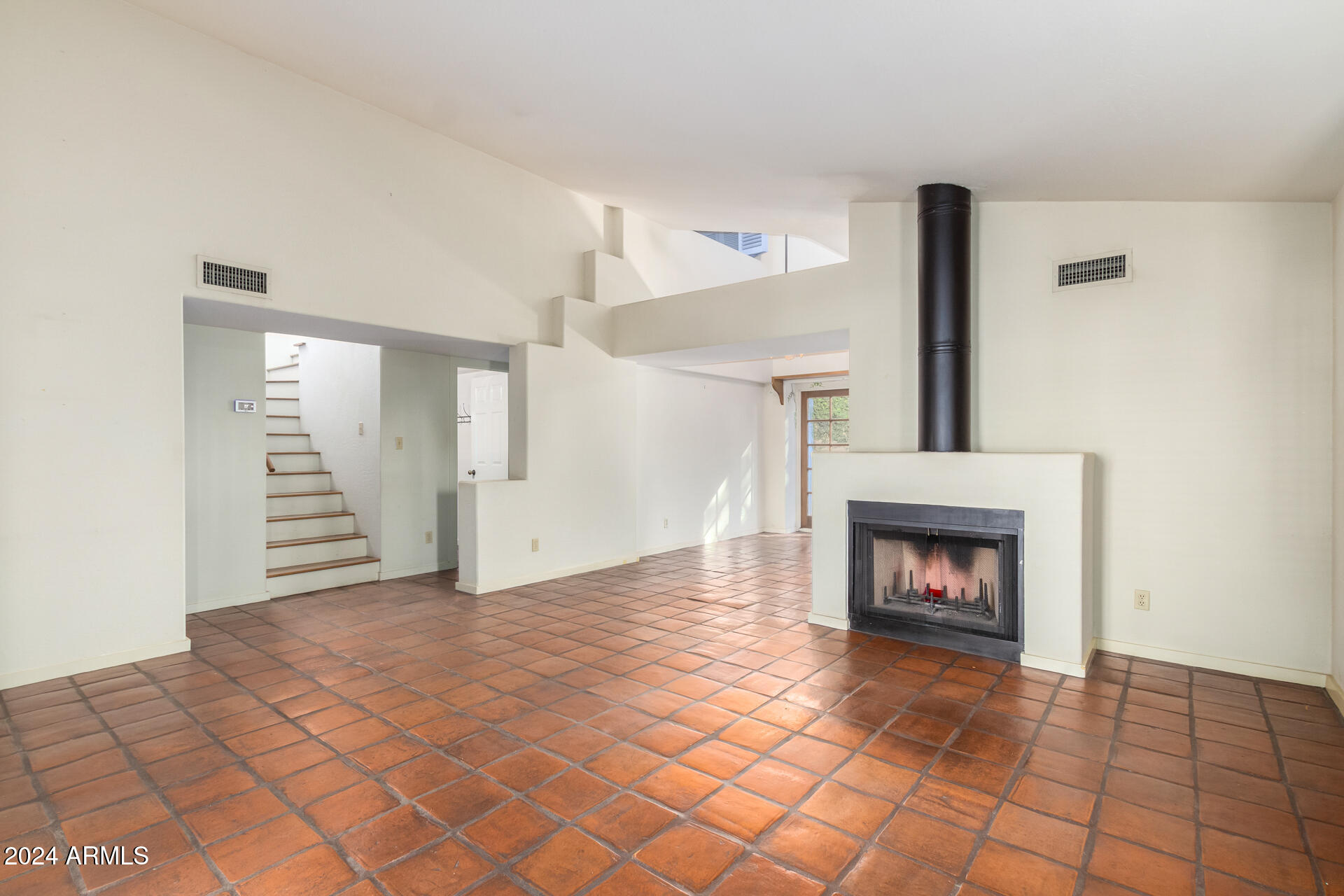 905 East Ocotillo Road Phoenix, AZ 85014 - Photo 5 of 20 a view of an empty room with fire place