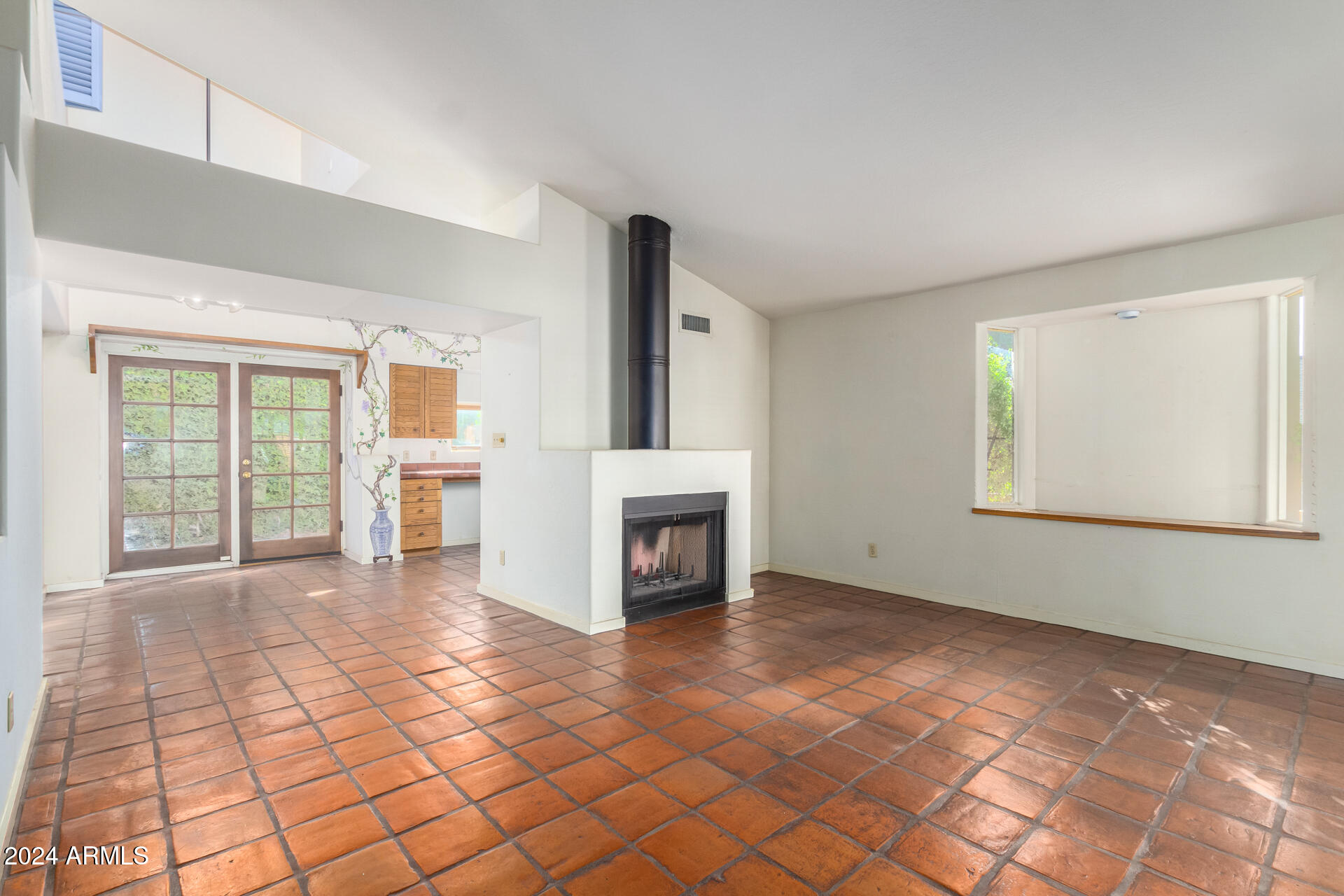 905 East Ocotillo Road Phoenix, AZ 85014 - Photo 6 of 20 a view of a livingroom with a fireplace