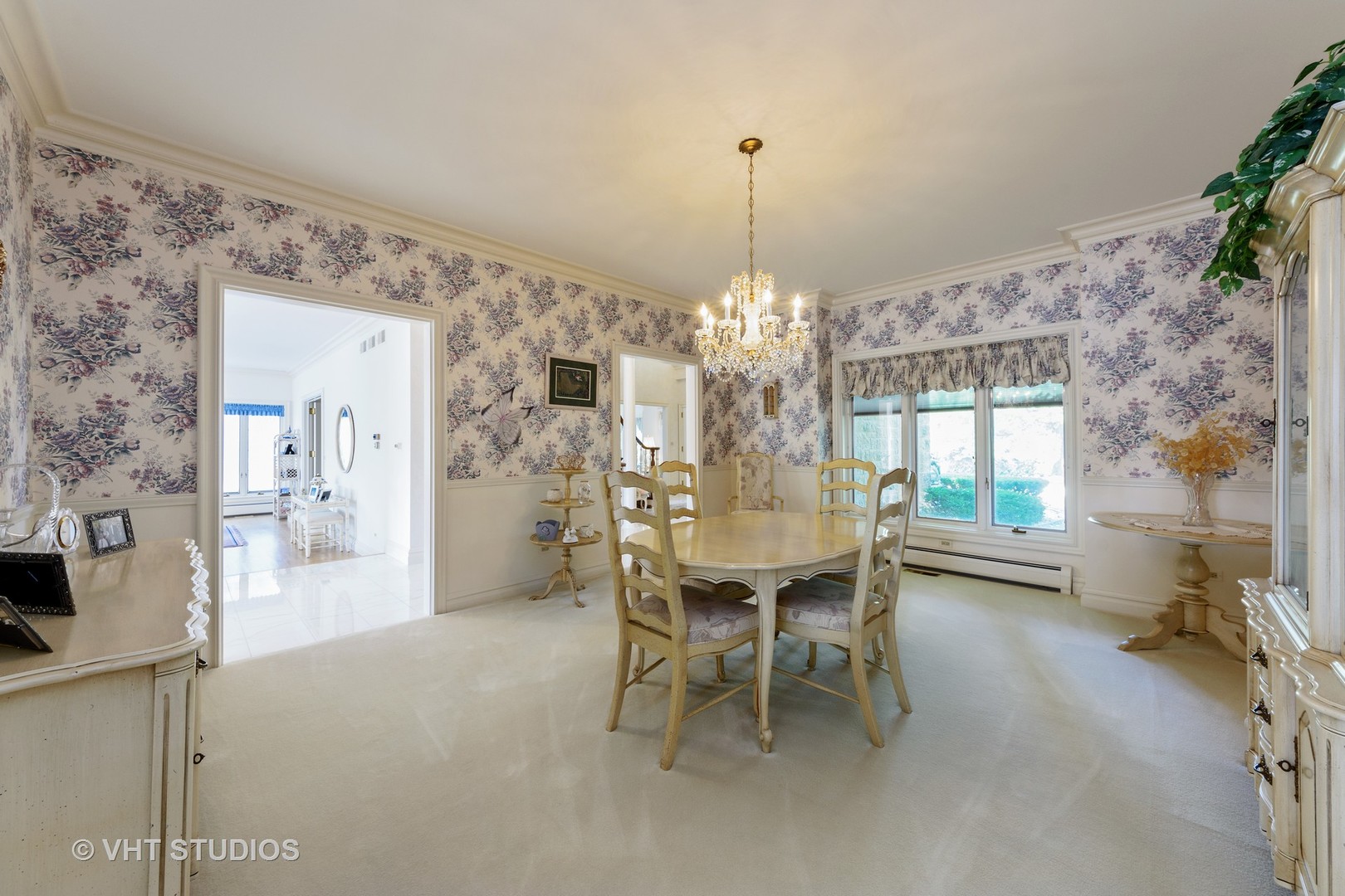 215 West Dundee Road Barrington, IL 60010 - Photo 11 of 34 a view of a dining room with furniture and chandelier