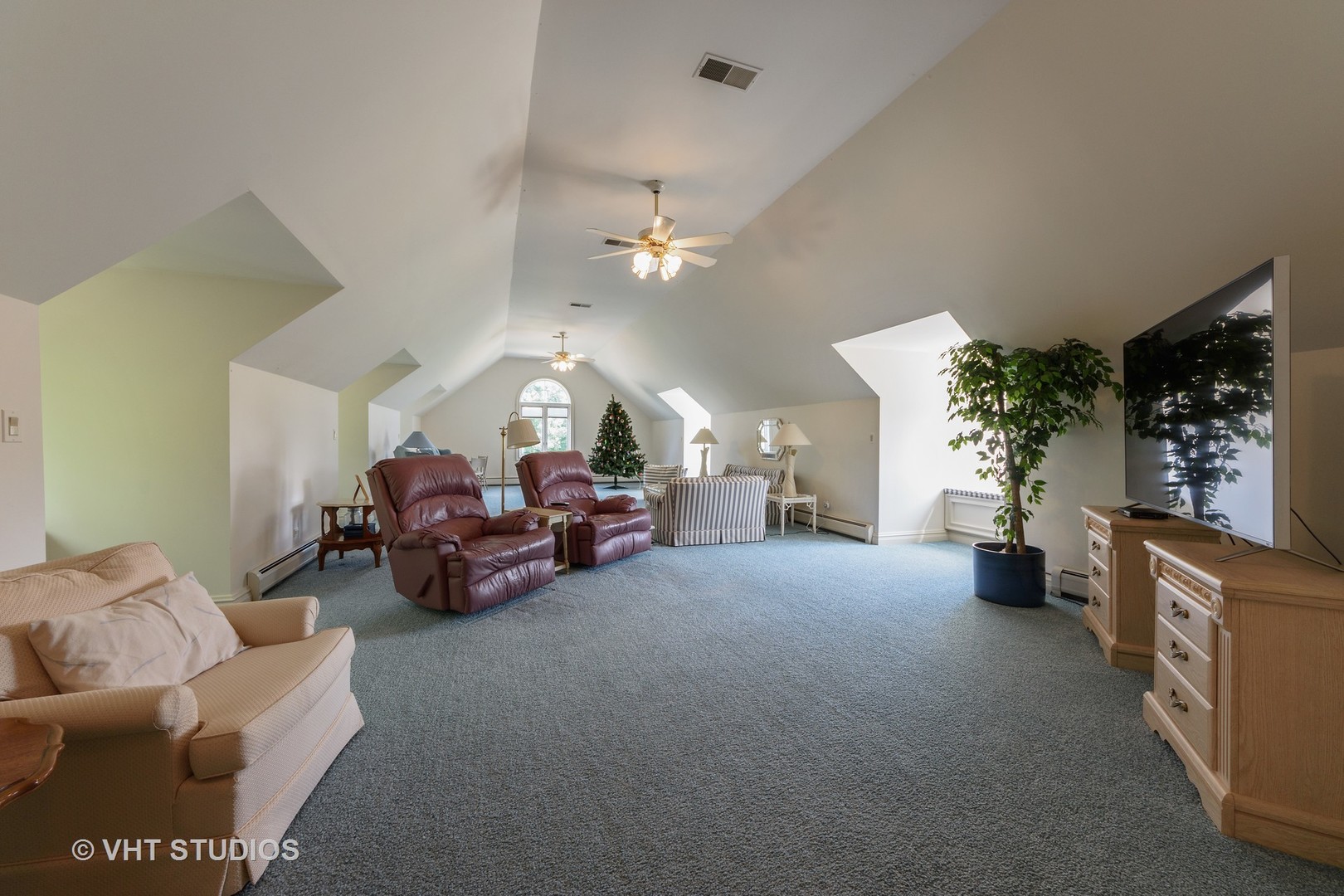 215 West Dundee Road Barrington, IL 60010 - Photo 17 of 34 a living room with furniture and a chandelier