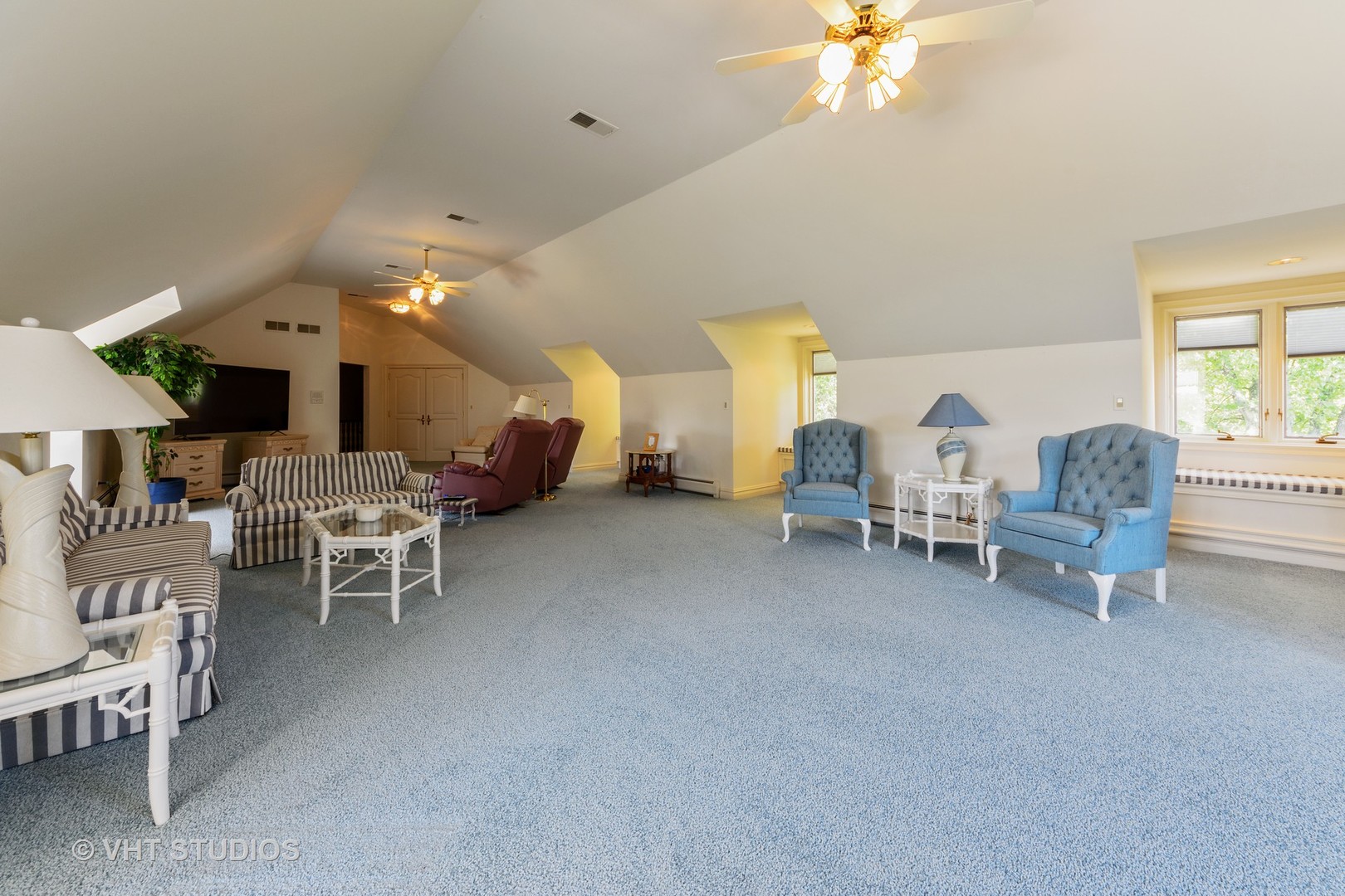 215 West Dundee Road Barrington, IL 60010 - Photo 18 of 34 a living room with furniture and a chandelier