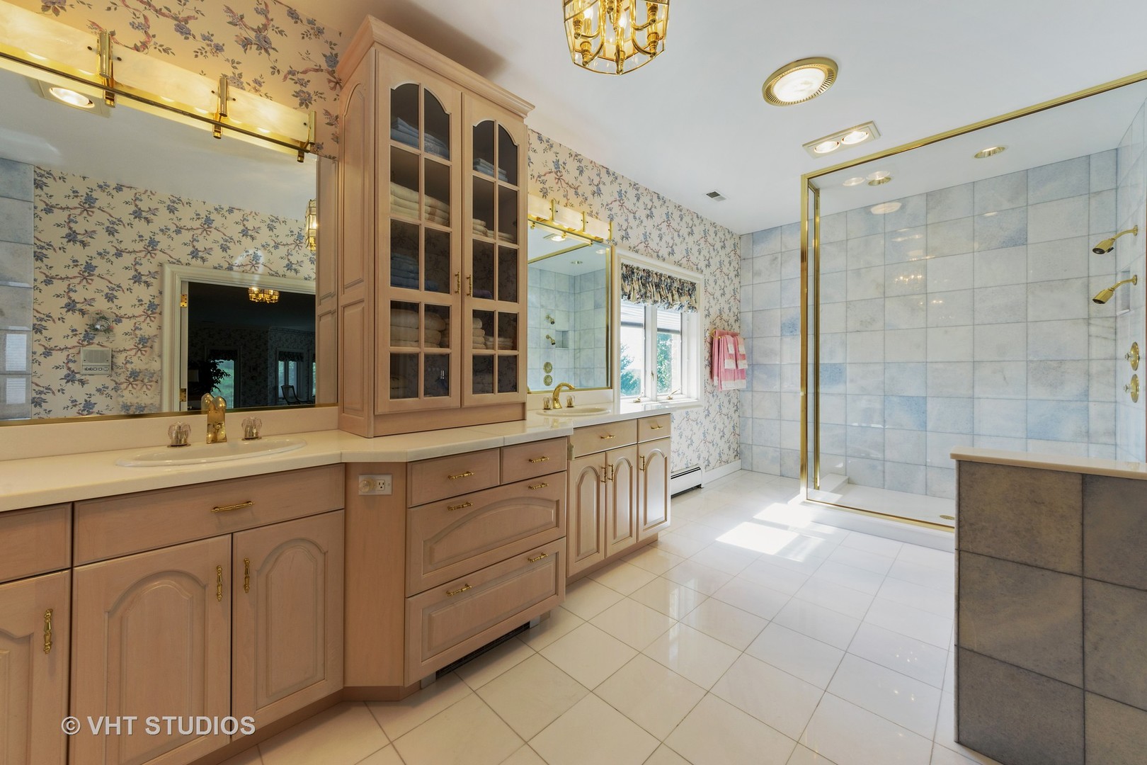 215 West Dundee Road Barrington, IL 60010 - Photo 20 of 34 a bathroom with a double vanity sink a mirror and a shower