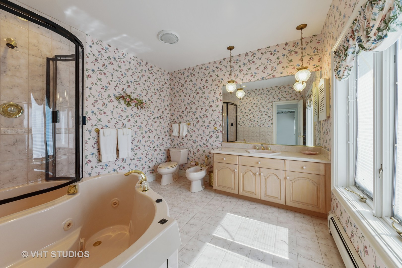 215 West Dundee Road Barrington, IL 60010 - Photo 25 of 34 a large bathroom with a granite countertop tub a sink and a large mirror