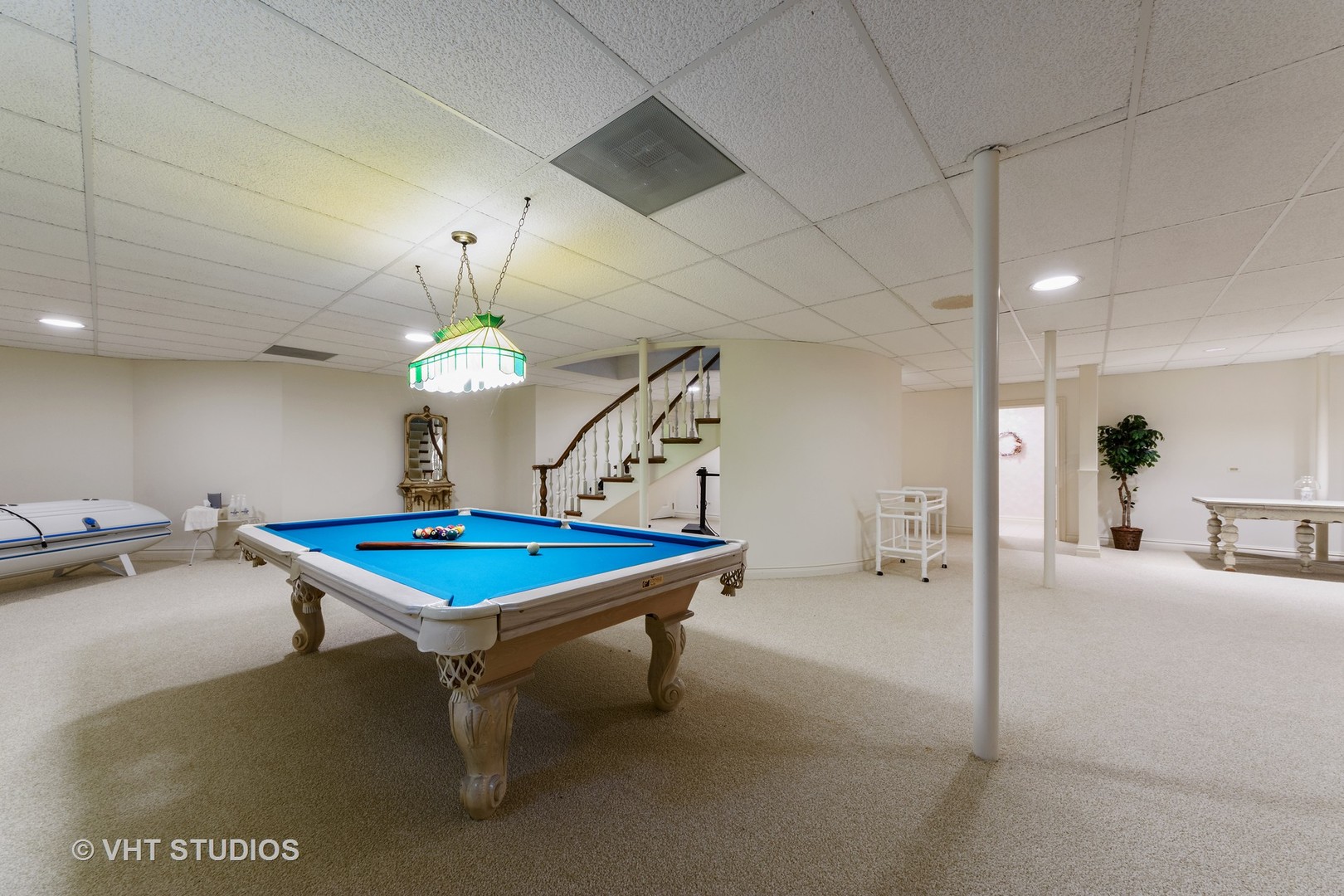 215 West Dundee Road Barrington, IL 60010 - Photo 29 of 34 a room with table chairs and a chandelier