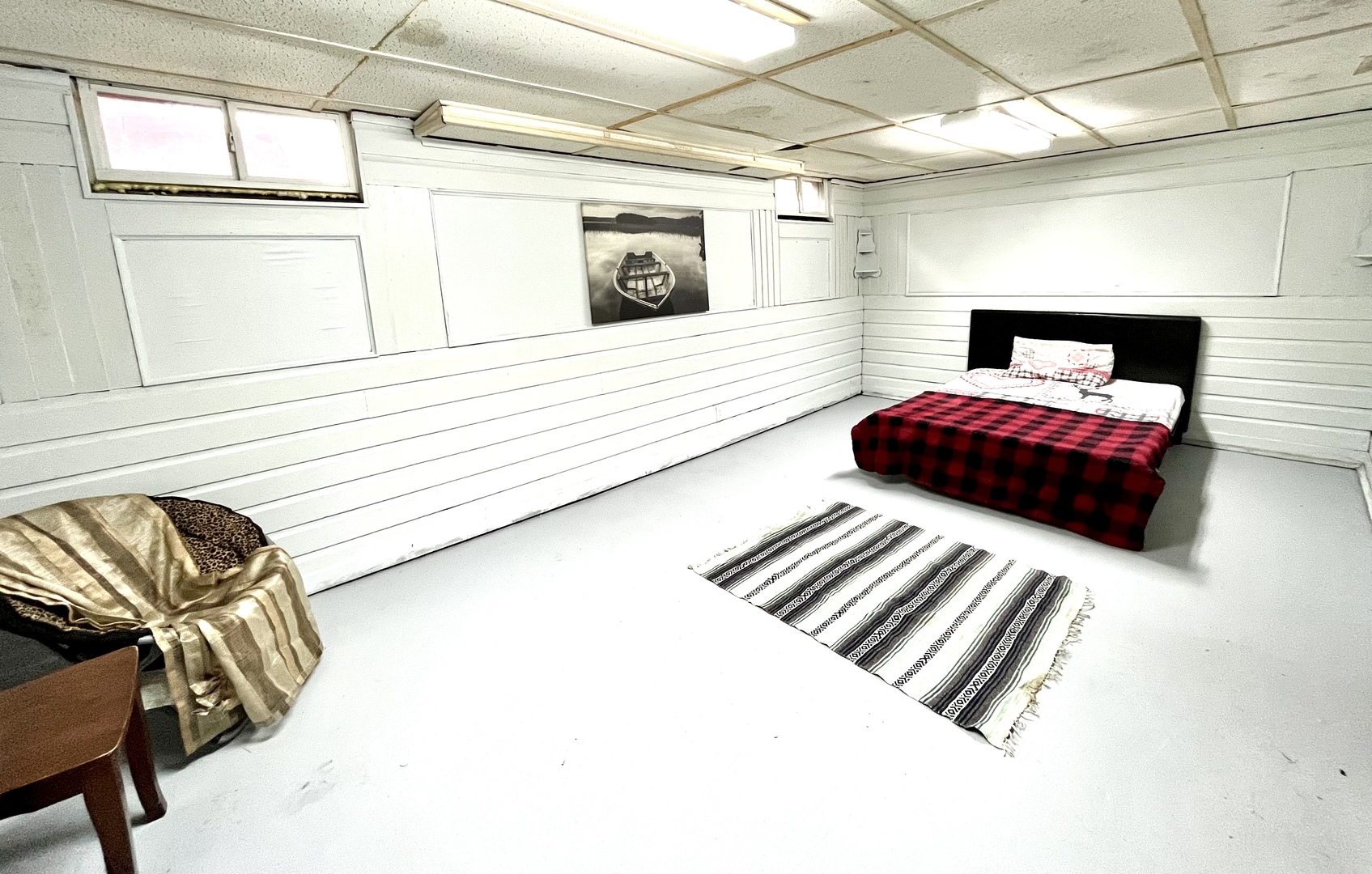 712 South 4th Street DeKalb, IL 60115 - Photo 18 of 25 a bedroom with a bed and a window