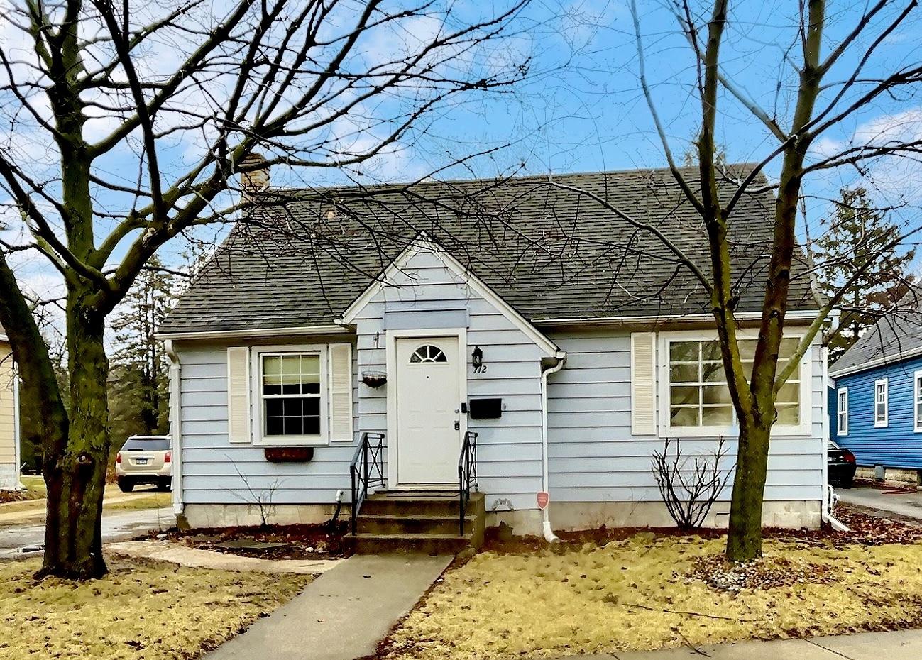 712 South 4th Street DeKalb, IL 60115 - Photo 2 of 25 a view of a house with a yard