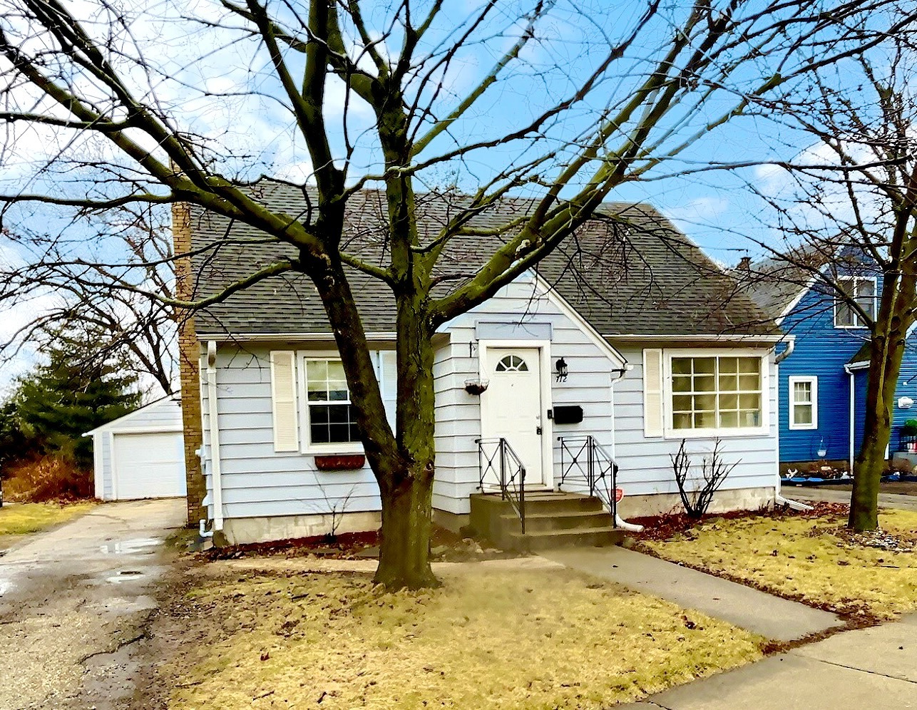 712 South 4th Street DeKalb, IL 60115 - Photo 25 of 25 a view of a house with snow on the tree