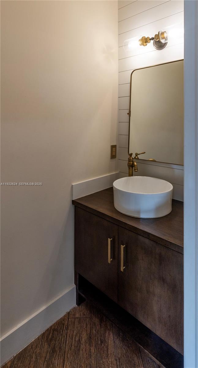 13276 Southwest 128th Street Miami, FL 33186 - Photo 11 of 27 a bathroom with a sink and a mirror