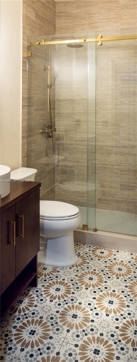 13276 Southwest 128th Street Miami, FL 33186 - Photo 17 of 27 a bathroom with a toilet and a shower