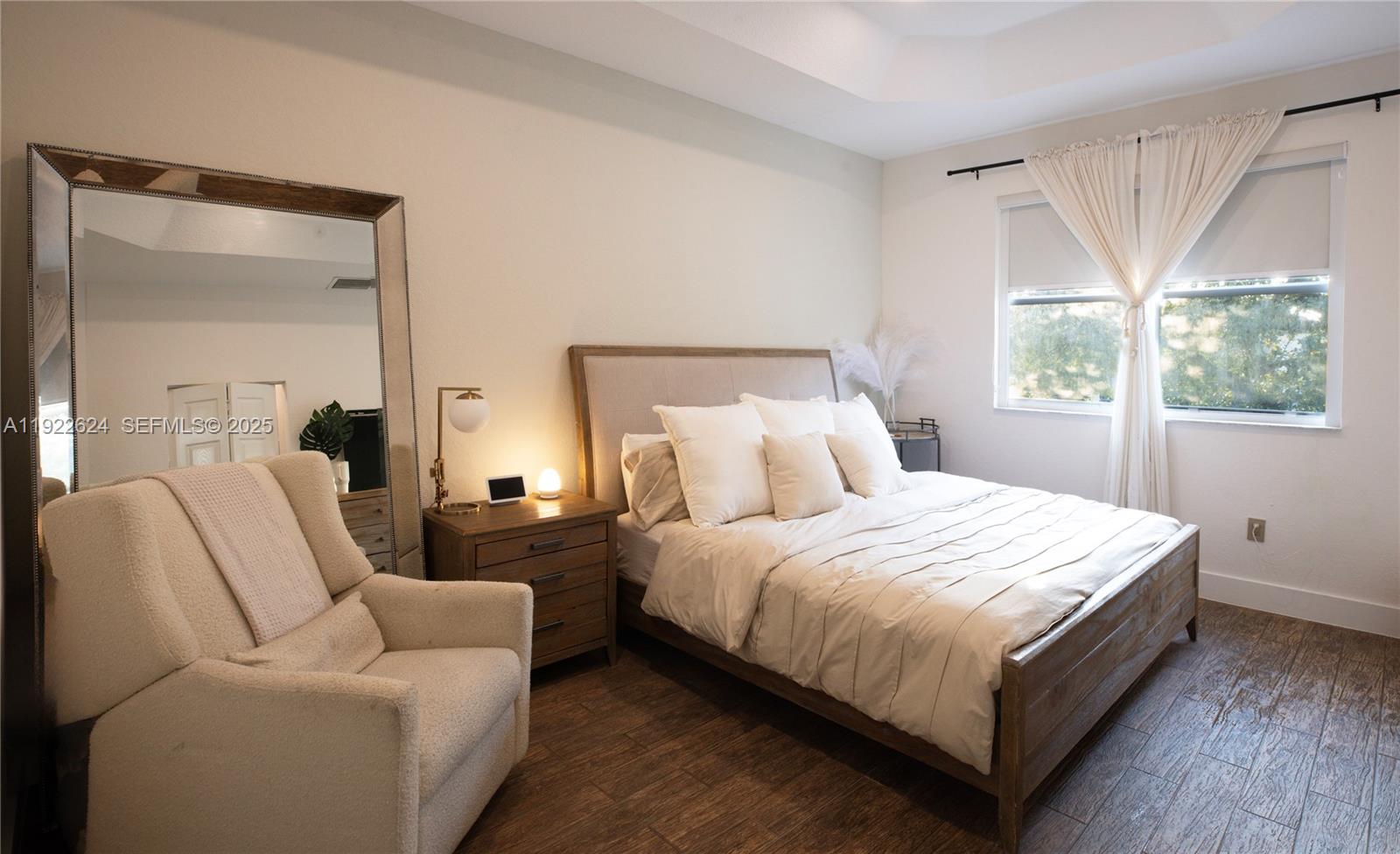 13276 Southwest 128th Street Miami, FL 33186 - Photo 23 of 27 a bedroom with bed and window