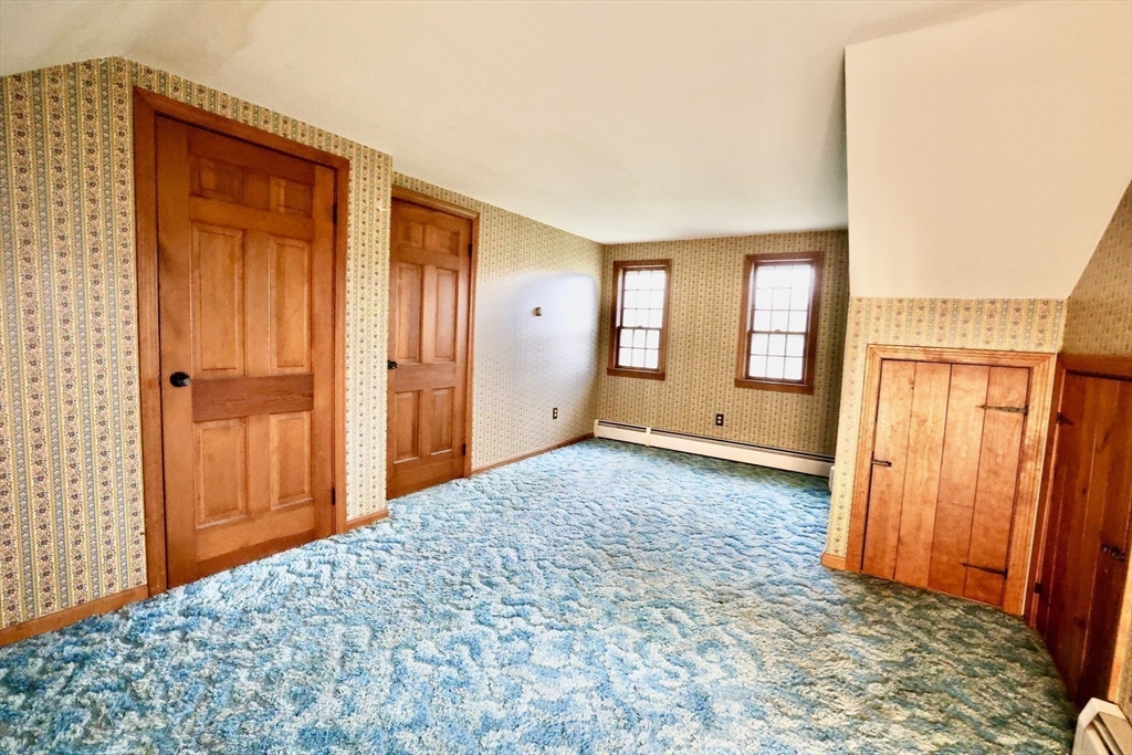 93 Ferry Road Salisbury, MA 01952 - Photo 24 of 32 an empty room with windows and closet