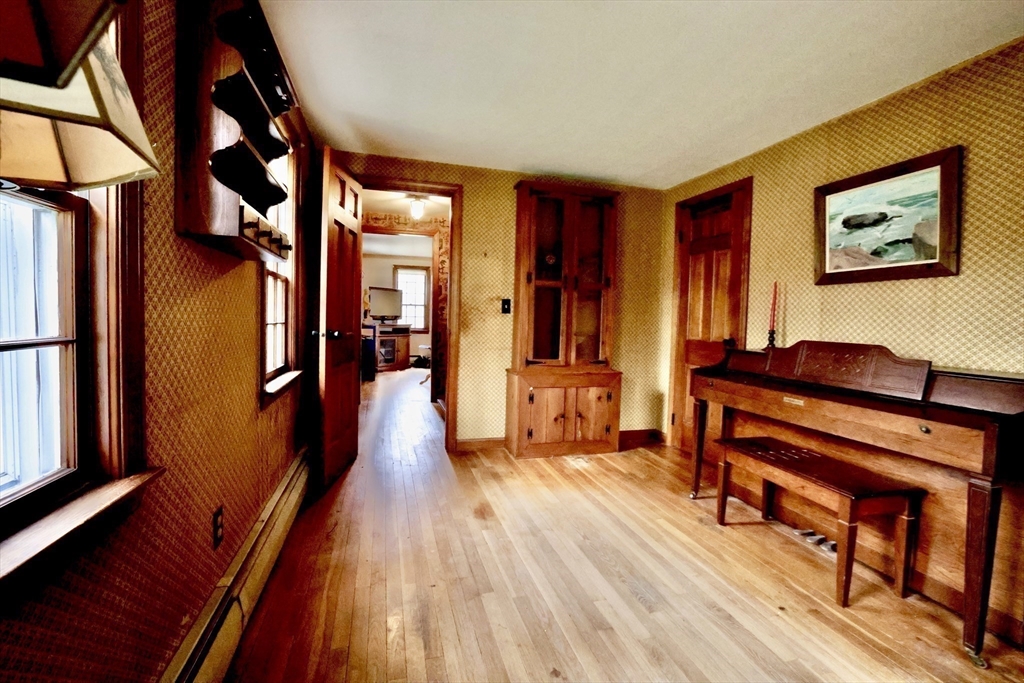 93 Ferry Road Salisbury, MA 01952 - Photo 8 of 32 a living room with furniture and a wooden floor