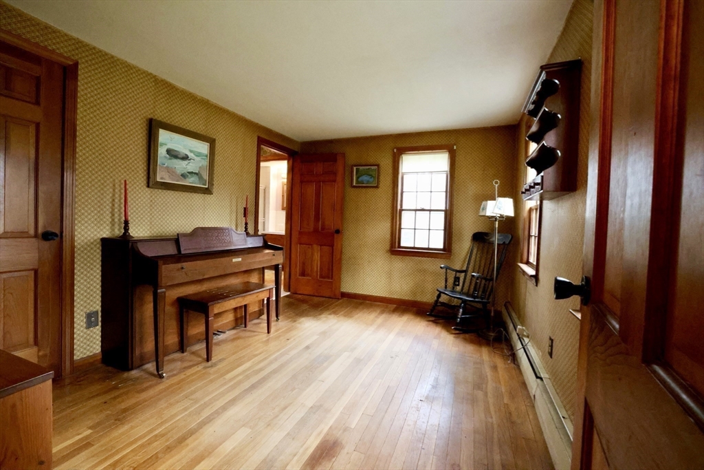 93 Ferry Road Salisbury, MA 01952 - Photo 9 of 32 a view of a livingroom with furniture and a window