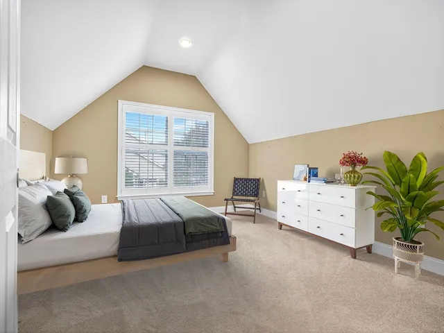 a bedroom with furniture and a couch