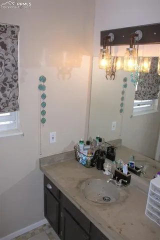 a stove top oven sitting inside of a kitchen