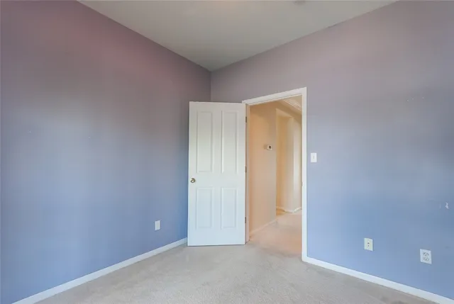 a view of a balcony with wooden floor