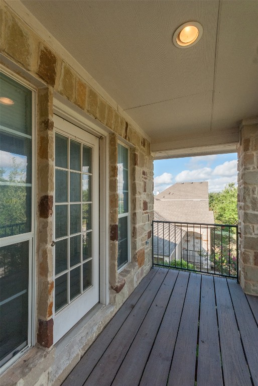 1101 Hidden View Place Round Rock, TX 78665 - Photo 17 of 37 a view of a balcony with wooden floor