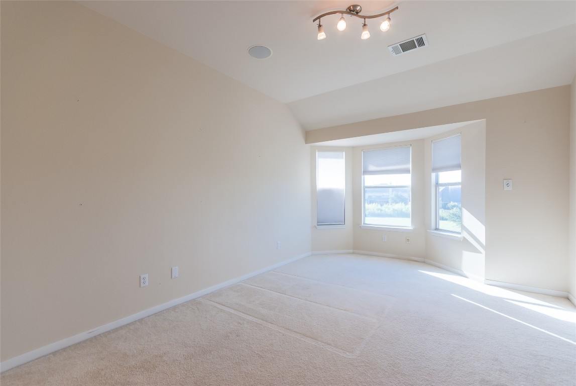 1101 Hidden View Place Round Rock, TX 78665 - Photo 20 of 37 a view of an empty room with a window