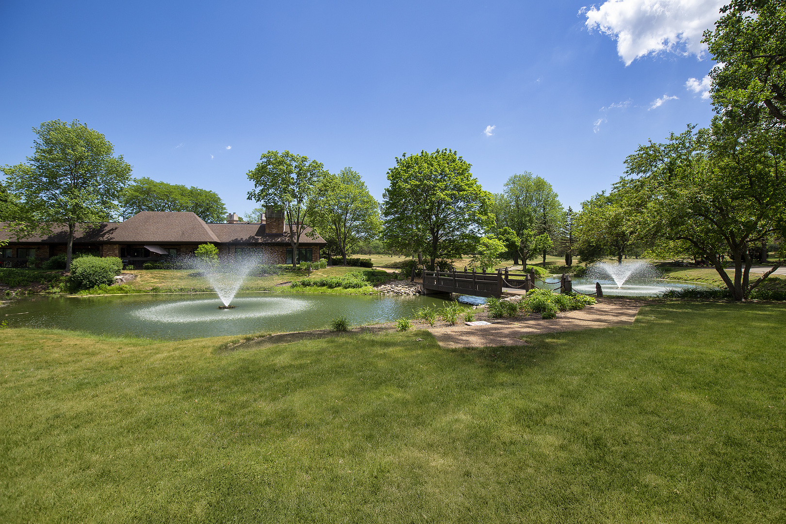 1621 Mission Hills Road, Unit 104 Northbrook, IL 60062 - Photo 18 of 29 a view of a lake with houses