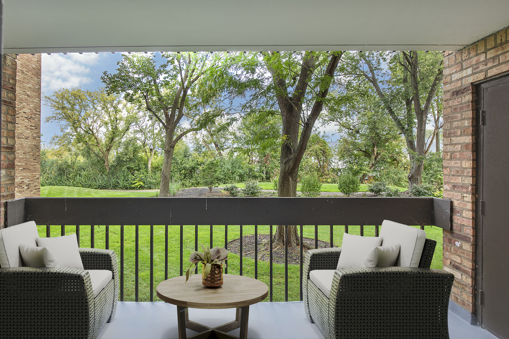 1621 Mission Hills Road, Unit 104 Northbrook, IL 60062 - Photo 8 of 29 a view of a two chairs in the roof deck