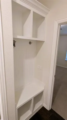 a view of an empty walk in closet