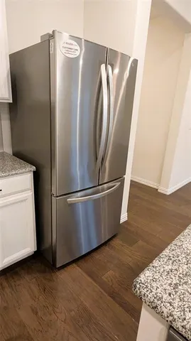 a view of a sink with wooden floor