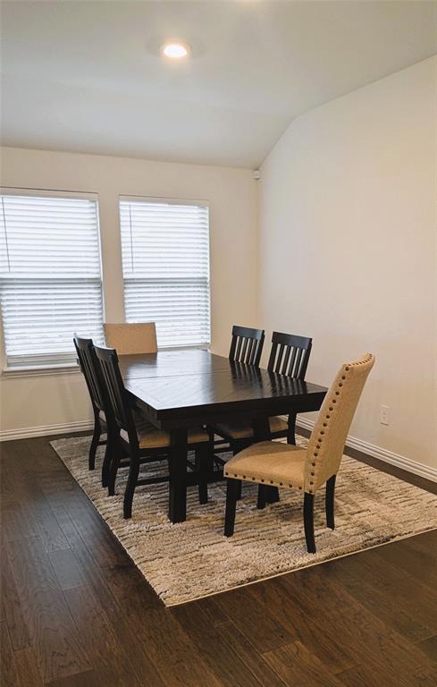 2408 Wildhaven Road Crandall, TX 75114 - Photo 25 of 39 Dining room with healthy amount of natural light, dark wood-style flooring, lofted ceiling, and recessed lighting