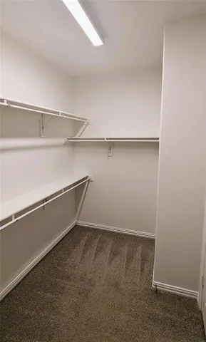 a room with walk in closet