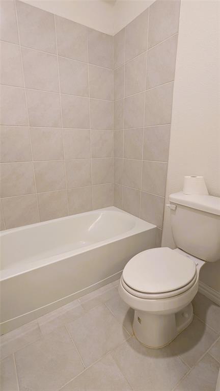 2408 Wildhaven Road Crandall, TX 75114 - Photo 5 of 39 Bathroom with tile patterned floors and tub / shower combination