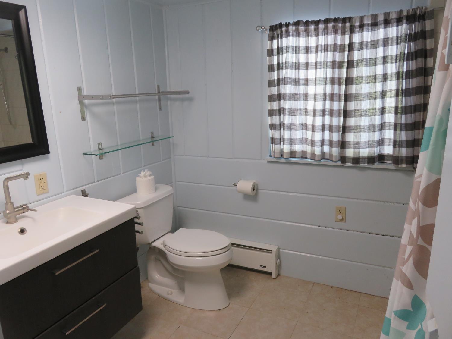 2563 Woodhouse Mine Road West Point, CA 95255 - Photo 44 of 49 a bathroom with a sink toilet and shower