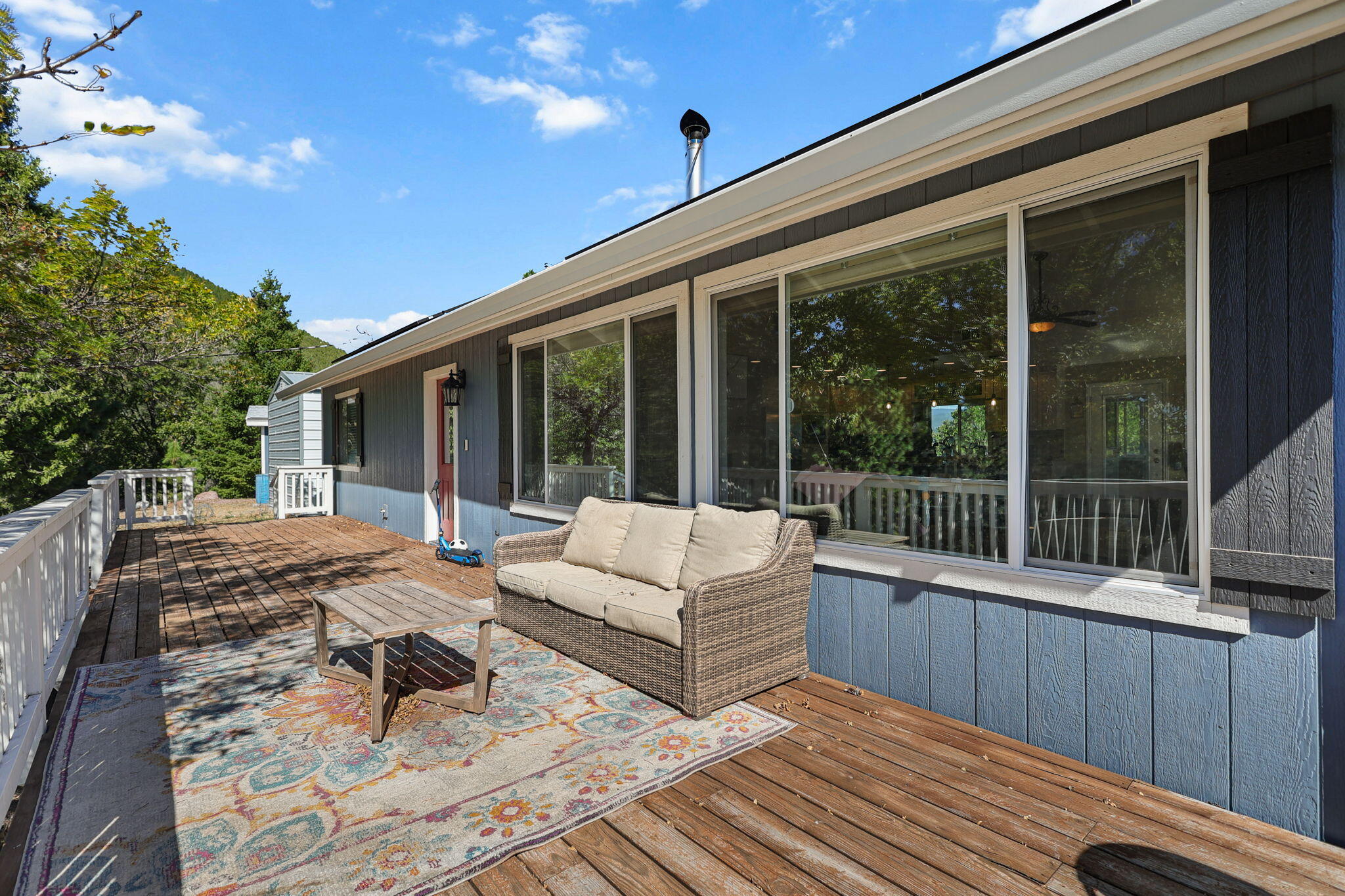 29453 Round Mountain Road Bella Vista, CA 96008 - Photo 24 of 31 a view of a house with backyard and porch
