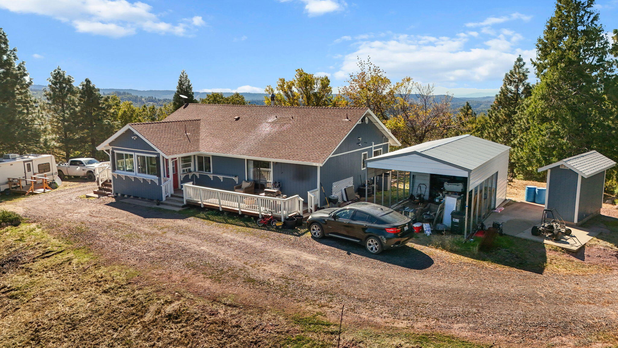 29453 Round Mountain Road Bella Vista, CA 96008 - Photo 28 of 31 a car parked in front of house