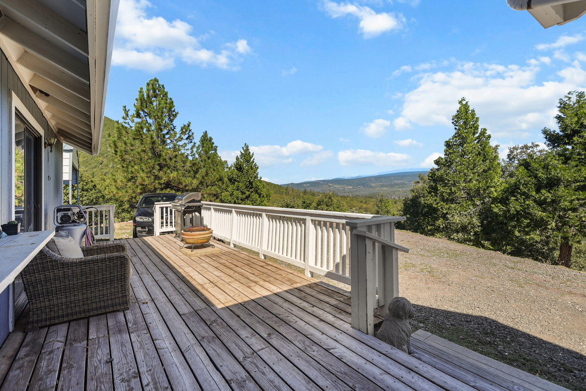 29453 Round Mountain Road Bella Vista, CA 96008 - Photo 3 of 31 a view of balcony with deck and outdoor space