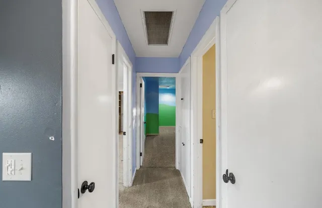 a bathroom with a shower and a mirror
