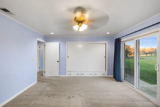 a bathroom with a shower and a sink